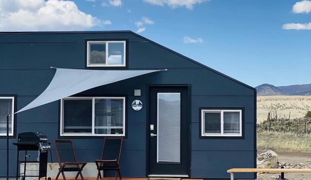 Tiny Home built on "Tiny House Nation" with one Queen bed in a loft and twin on main floor. Sleeps: 3